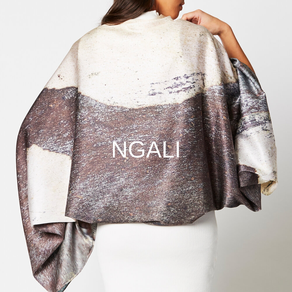  - Translating to ‘we’ or ‘us,’ in a number of Aboriginal languages, Ngali seeks to create the “us” we’d like to see: a harmonious, sustainable and equitable union of people - all people - with the planet.Immortalising 80,000 years of history and creativity through premium quality fashion, Ngali showcases the talent of remote Aboriginal artists by together translating their unique artwork on high-end clothing and collectibles.Founder Denni Francisco, a proud Wiradjuri woman, says,“Art is a lens through which our people see, understand and communicate with others. I want people to know who we are, who we’ve always been...that there’s more to us than what is seen through the lens of 200 years of colonisation.”